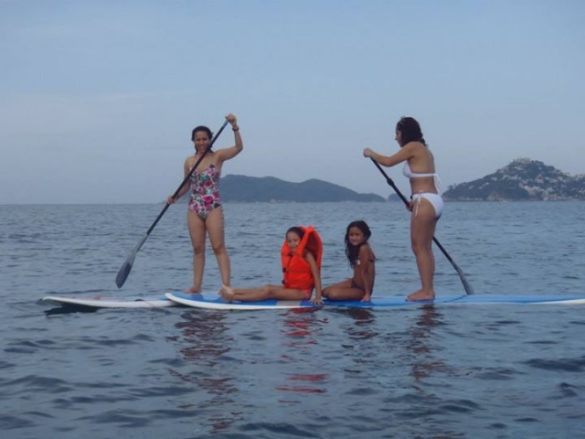 Remando con nenes